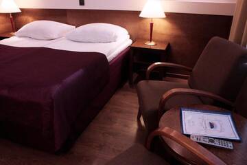 Фото номера Двухместный номер с 2 отдельными кроватями Отель Hotel Inari г. Инари 23