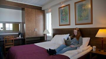 Фото номера Двухместный номер с 2 отдельными кроватями Отель Hotel Inari г. Инари 8